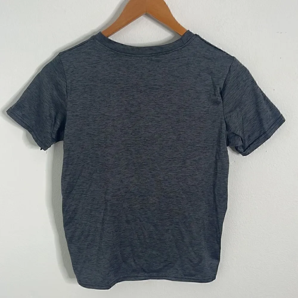 🌟3/20 NWOT Real Essentials athletic shirt.  Size Boys Large.